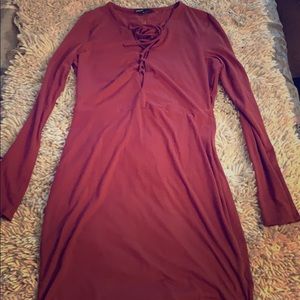 Long sleeve Mauve Mini dress with lace up v neck.